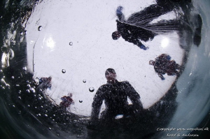 Ice dive, the picture is taken from below through 30 cm o... by Rene Braband Andersen 